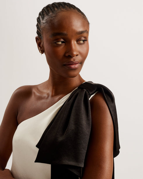 MIDORI-Dresses-Introducing the perfect party look. Featuring a one-shoulder design that's topped with an oversized bow, this satin mini dress exudes glamor. The A-line shift silhouette not only looks elegant, but it also leaves you room to get down on the dancefloor. Pair it with your favorite heels and you have a look that's perfect for the occasion. Mini dress One shoulder design Oversize bow embellishment Satin finish A-line shift silhouette Concealed side zip fastening Lydia is 5'10" / 1.77m and wears